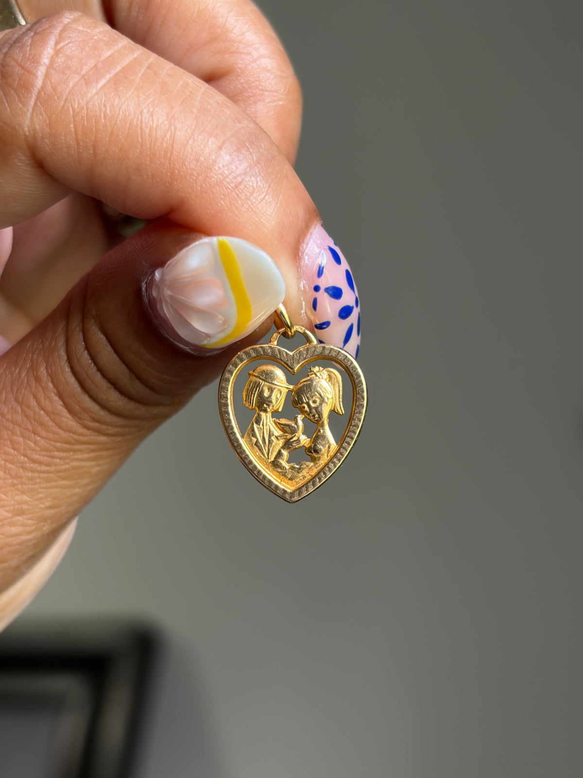 Vintage 18k French Lovers pendant
“Les Amoureux de Peynet”